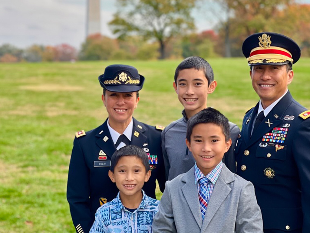 Courtney Sugai with her husband and three children in Washington D.C.