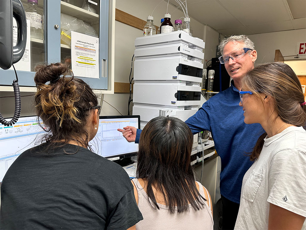 Professor Horgen with student researchers in a lab at HPU
