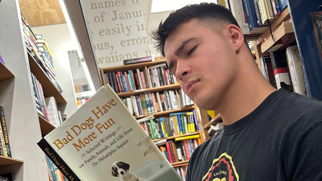 HPU Military Campus Programs student Caden Villegas spending time in the library