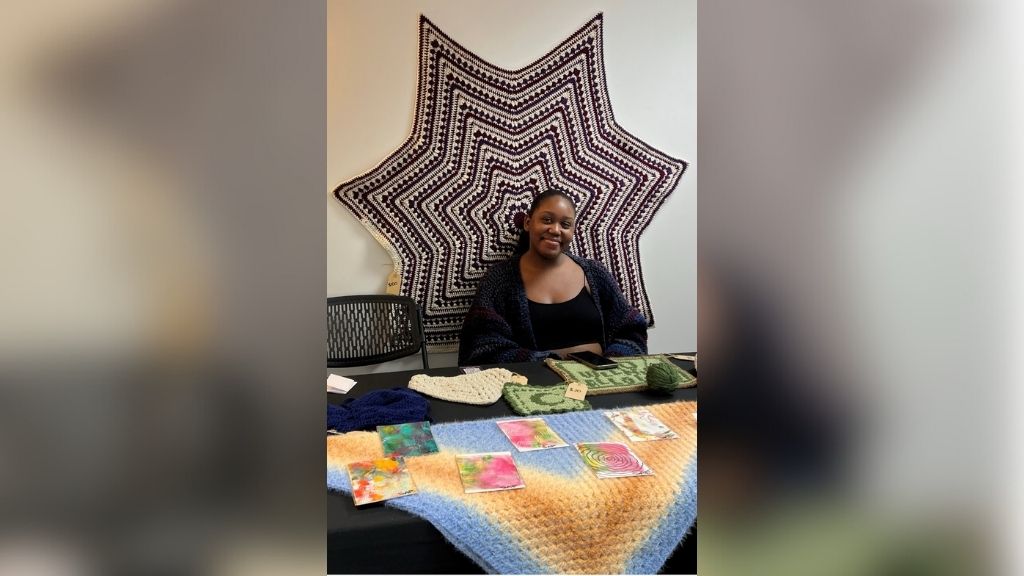 Saadiya Patrick, a student in ARTS 3000 and majoring in TESOL and Visual Art, represented her crochet business