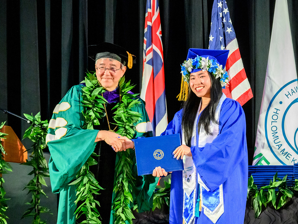 HPU President John Gotanda with an HPU graduate