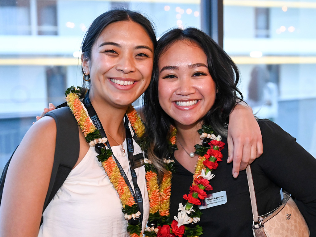 PA students Joelle Cantiberos (left) and Helene Agbayani (right) celebrated with family and friends at the PA welcome reception