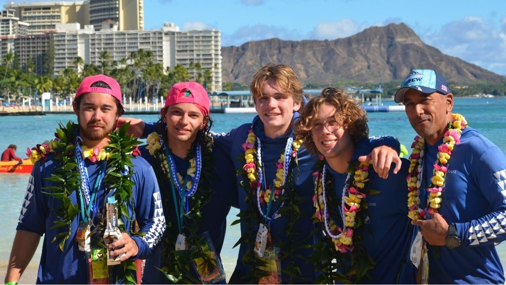 Pictured from left to right are members of HPU's Nā Manō ʻo Ke Kai Executive Board: Club President Jonah Stokes, Treasurer Owen Parker, Vice President Luke Dufner, and Secretary Mattias Namur, along with I Mua One Blade’s Coach Joel Olegario upon successfully crossing the Molokai Channel