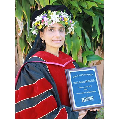 Hazel Downing w-teacher of the year plaque pla Headshot Omidyar Fellows