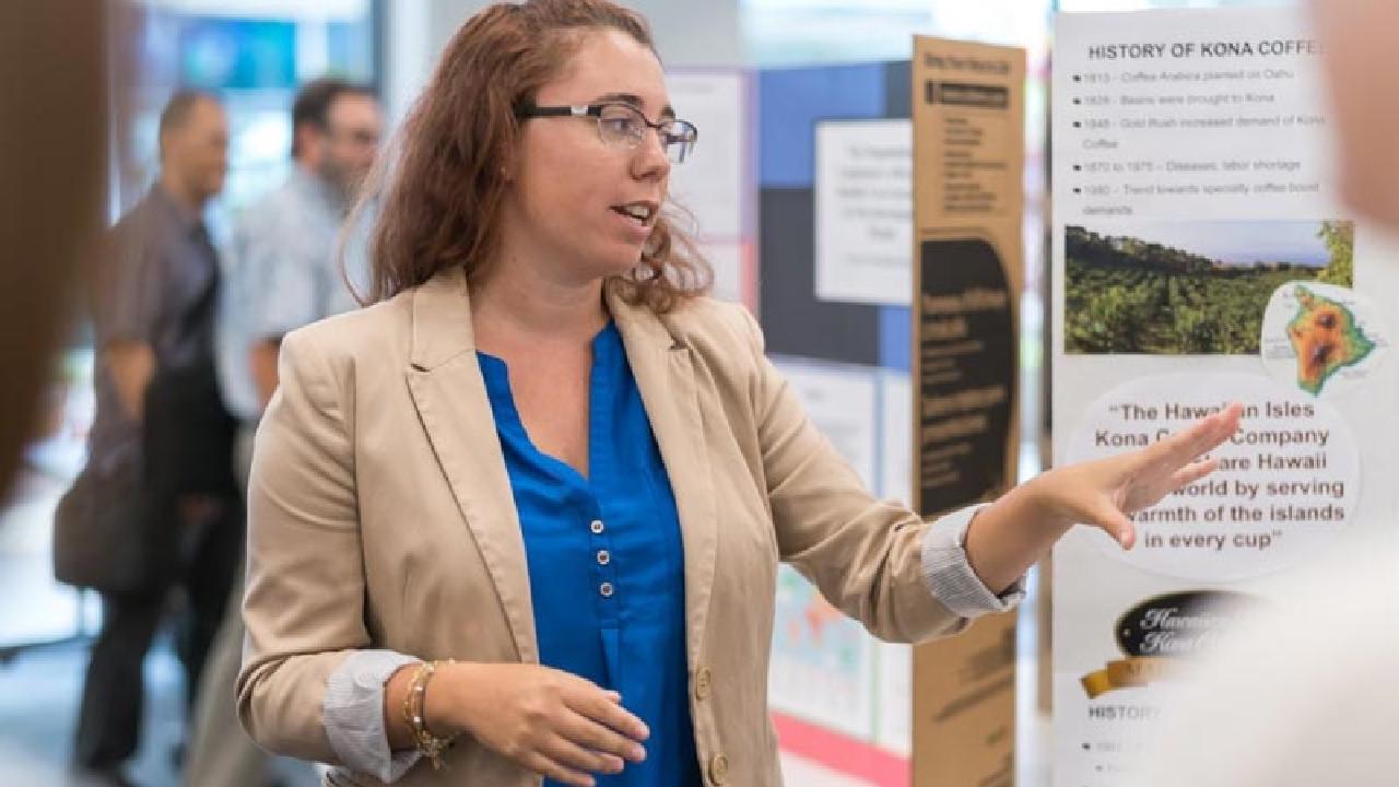 Image of an academic project being presented to a small group